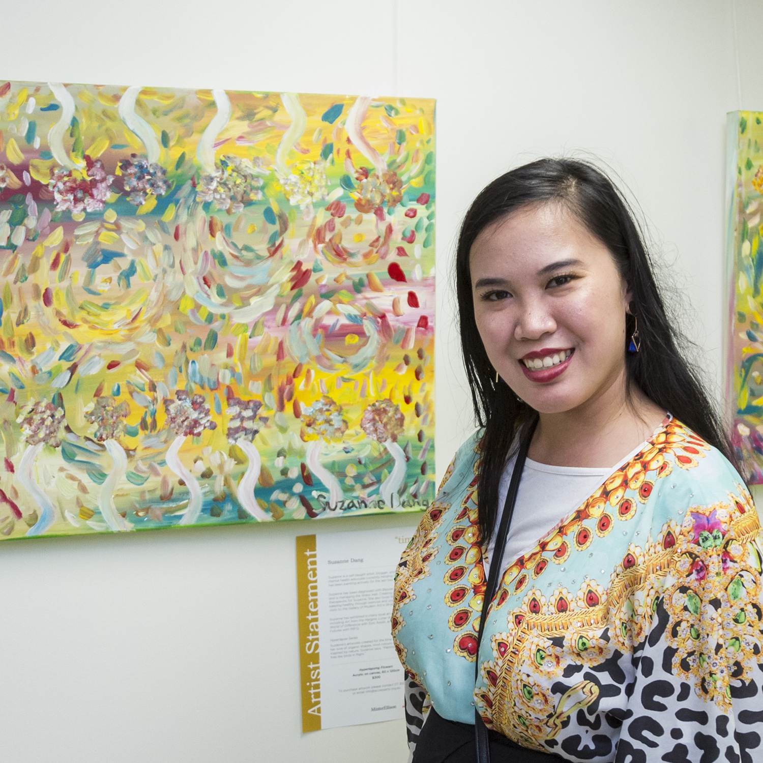 Artist Suzanne Dang with her artwork