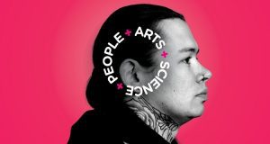 Persons head on a bright pink background with text in a circle around it